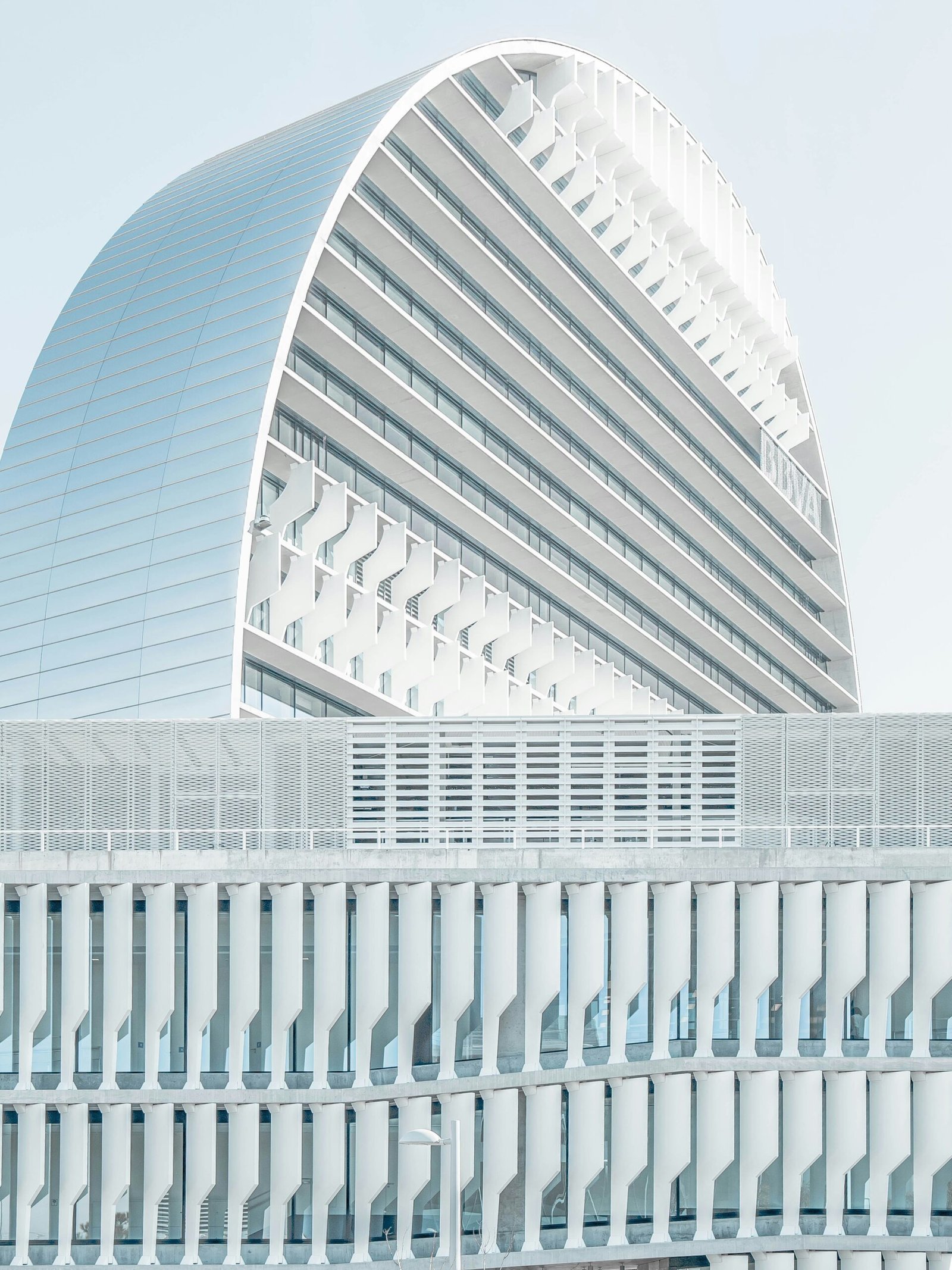 mirrored building under blue sky